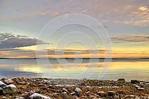 Sunset over lake in Lulea, Sweden photo
