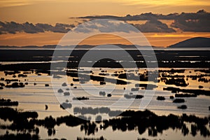 Sunset over Lake Titicaca - Peru photo