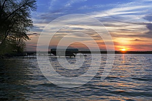 Sunset Over Leech Lake With Boat In Background