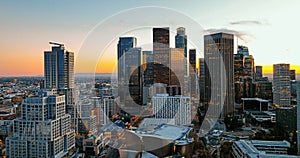 Sunset over Los Angeles downtown. Urban aerial view of downtown Los Angeles. Panoramic city skyscrapers.