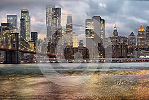 Sunset over Manhattan with brooklyn bridge. Cityscape of New York