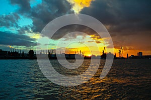 Sunset over maritime port