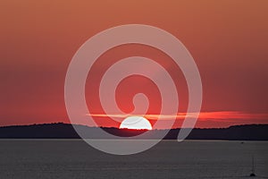 Sunset over the Mediterranean Sea, on the island of Menorca, Balearic Islands, Spain