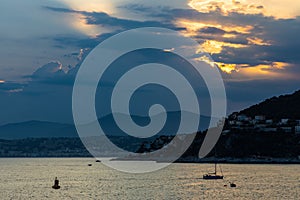 Sunset over Mediterranean Sea Nice Bay and Alpes coast offshore Saint-Jean-Cap-Ferrat resort town on Cap Ferrat cape in France