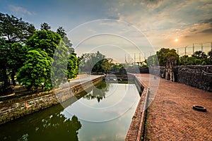Sunset over the moat at Fort Santiago, Intramuros, Manila, The