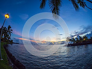 Sunset over Moorea Island, Intercontinental Resort and Spa Hotel in Papeete, Tahiti, French Polynesia