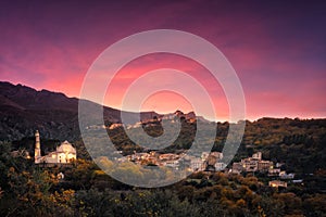 Sunset over mountain villages in Corsica