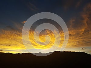 Colored clouds by sun