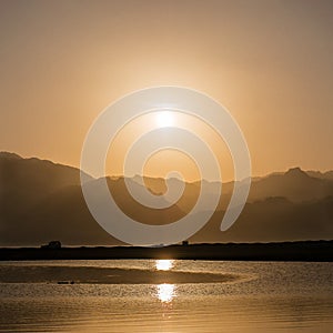 Sunset over mountains and lagoon in south Sinai, Dahab