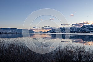 Sunset over the mountains at Osoyoos Lake on a winter day