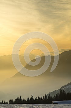 Sunset over the mountains, winter landscape