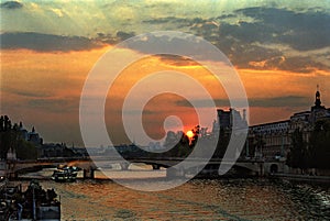 A sunset over the musÃ©e du Louvre, seen from pont Neuf