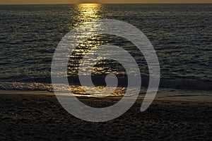 Sunset over Mylos beach - Lefkada island, Greece photo