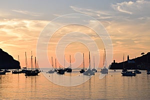 Sunset over natural harbor of Port de Soller on Majorca