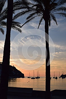 Sunset over natural harbor of Port de Soller on Majorca