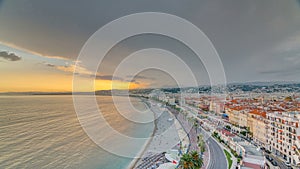 Sunset over Nice city and Mediterranean Sea aerial timelapse