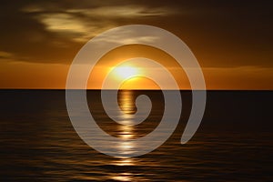 Sunset over the ocean. Blurry abstract art background in digital motion effect.