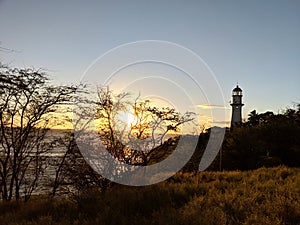 Sunset over the ocean and Diamond Head Lighthouse on Oahu