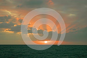 Sunset over the ocean in the sea of Abaco. Bahamas photo