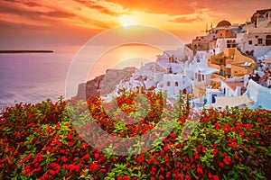 Sunset over Oia town on Santorini island in summer. Santorini, Greece