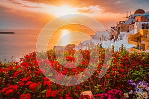 Sunset over Oia town on Santorini island in summer. Santorini, Greece