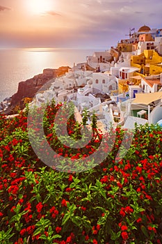 Sunset over Oia town on Santorini island in summer. Santorini, Greece