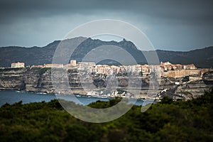 Sunset over the Old Town of Bonifacio, the limestone cliff