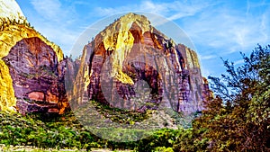 Sunset over the peak of Mount Majestic towers over the Emerald Pool Trail along the Virgin River in Zion National Park