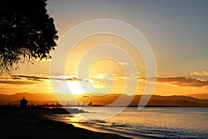 Sunset over Perfume Point, Westshore, Hawkes Bay, New Zealand photo