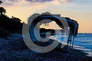 Sunset over Perivolia beach in Cyprus photo