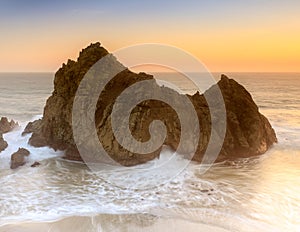 Sunset over Pfeiffer Beach Keyhole Rock. Big Sur, CA