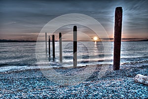 Sunset over the pilings at Point Roberts