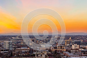 Sunset over Portland OR Cityscape and Mt Saint Helens USA