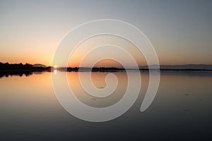 Sunset over the ptujsko jezero dam on drava river in Ptuj in Slovenia