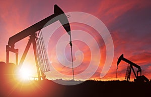 Sunset Over Pumpjack Silhouette With Copy Space