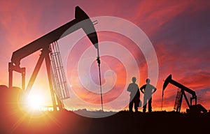 Sunset Over Pumpjack Silhouette With Copy Space