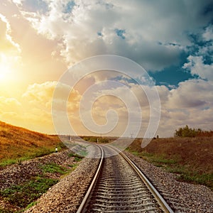 Sunset over railroad to horizon