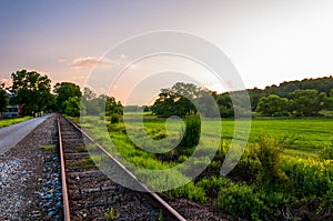 Sunset over railroad tracks and fields in York County, PA