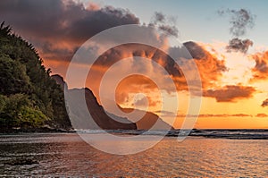 Sunset over the receding mountains of the Na Pali coast of Kauai in Hawaii