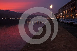 Sunset over river Arno in Florence