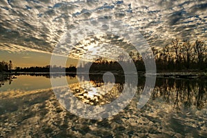 Sunset over river Brembo, Italy