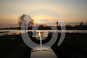 Sunset over the river rotte and waterstorage of the Eendragtspolder in Zevenhuizen, Netherlands