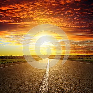 Sunset over road