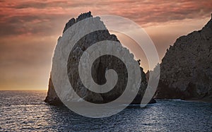 Sunset over a Rock Formation in Cabo San Lucas, Mexico