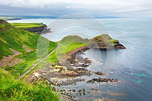 sunset over rocks formation Giants Causeway, County Antrim, Northern Ireland, UK