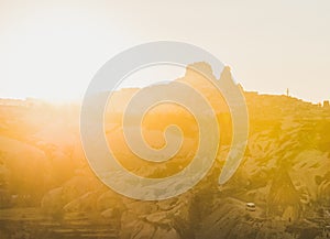 Sunset over rocks of Goreme and Uchisar castle, Cappadocia, Turkey