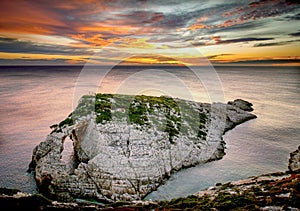 Sunset over the rocks at krakonisi zakynthos