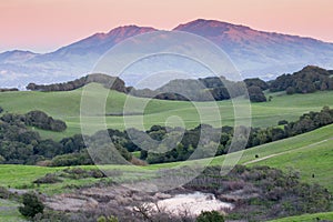 Sunset over Rolling Grassy Hills and Diablo Range of Northern California