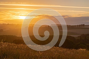 Sunset over the rolling hills in Elkenrade in the of south Limburg in the Netherlands with a spectacular view over the fields