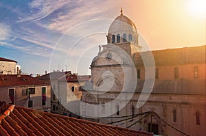 Sunset over the roofs of Sibenik, Croatia photo